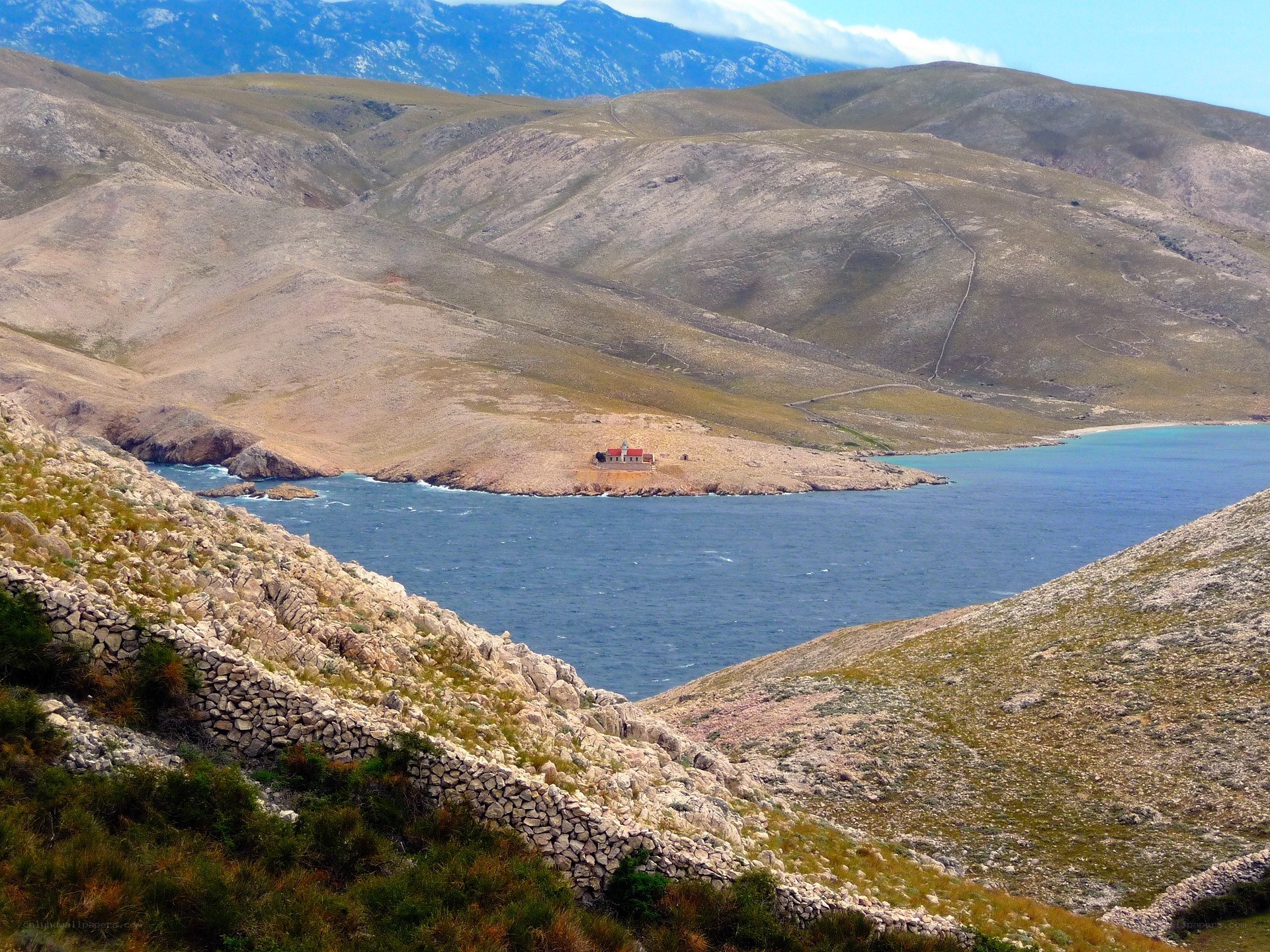 coastal landscape with small building