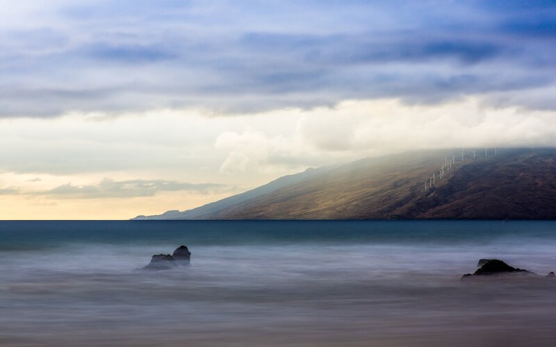 Coastal landscape with wind turbines