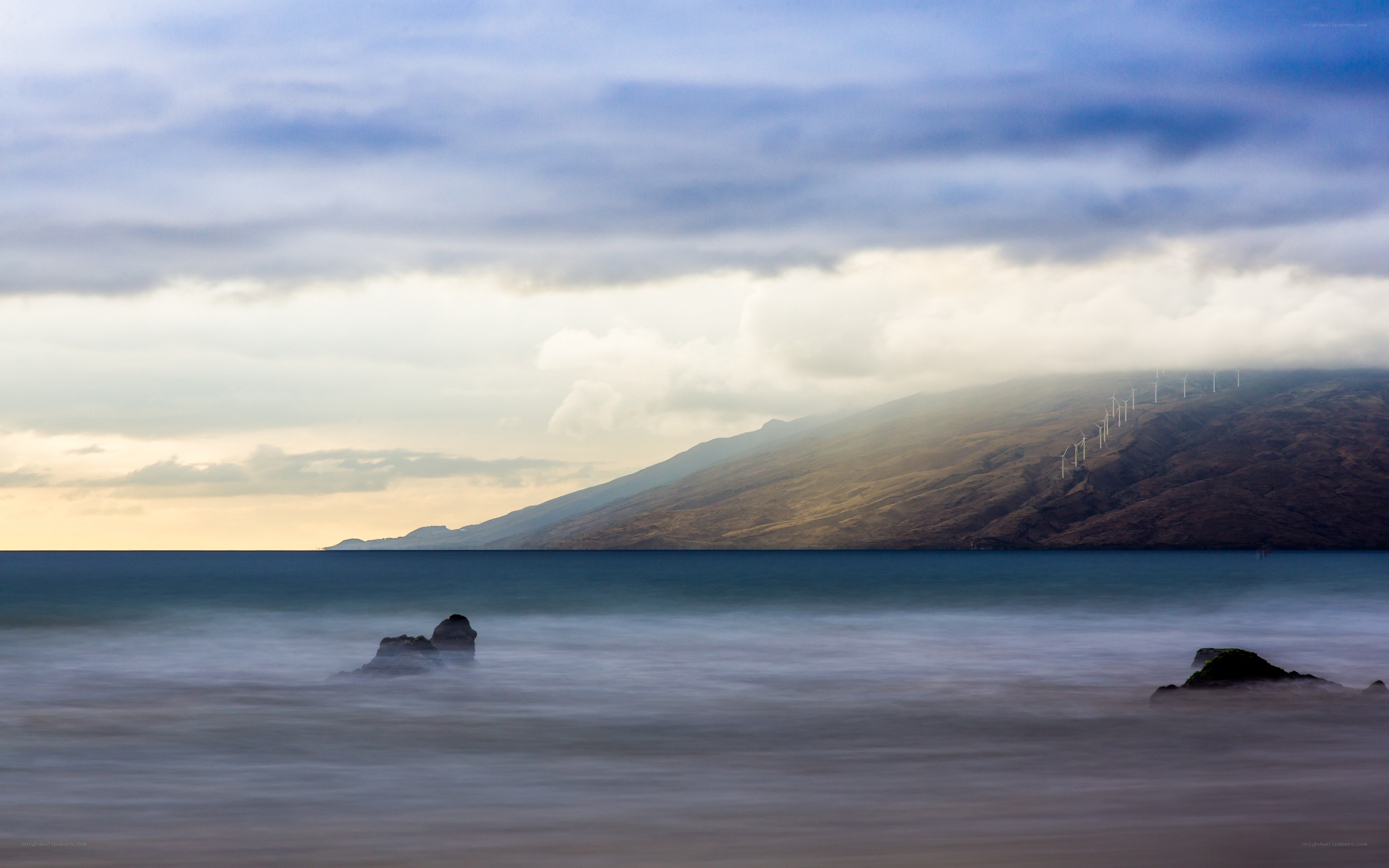 Coastal landscape with wind turbines