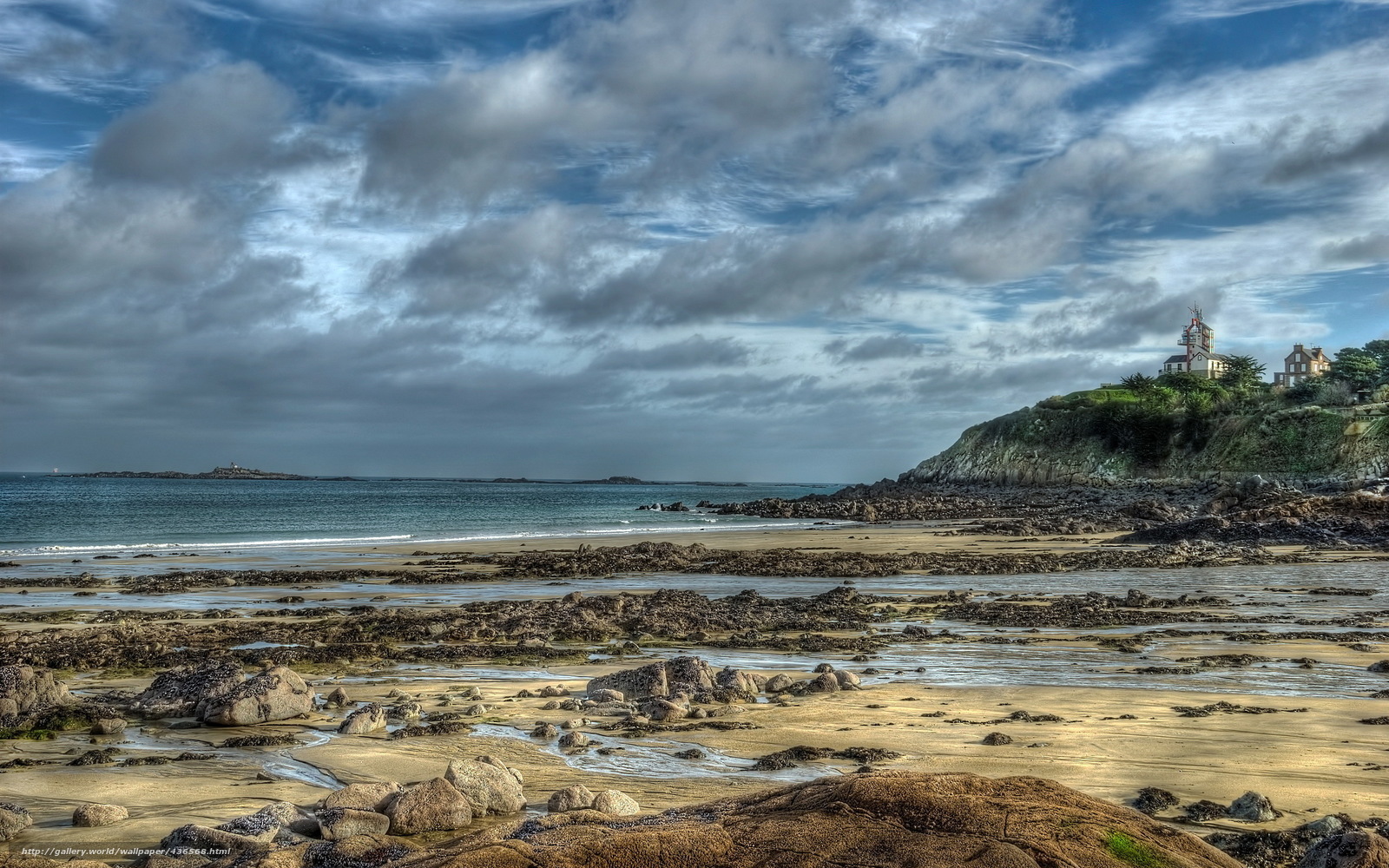 Coastal lighthouse at low tide