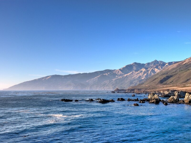 Coastal Mountains and Ocean — Blue, Serene, Afternoon, Photograph, Rocks, Brown