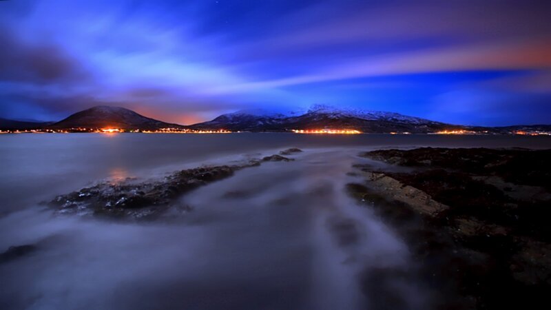 coastal night with mountains