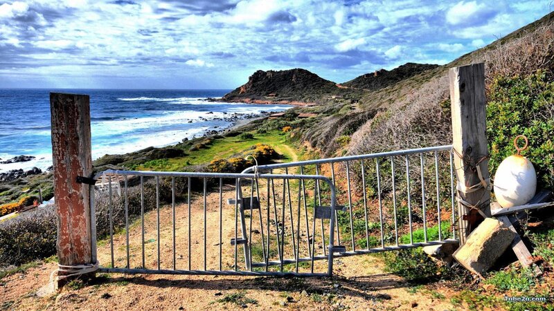 Coastal path with metal gate