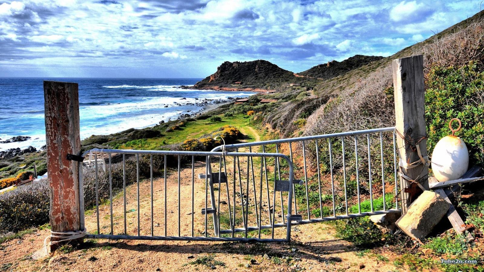 Coastal path with metal gate