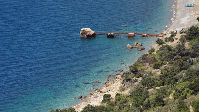 coastal pier and rocky shore