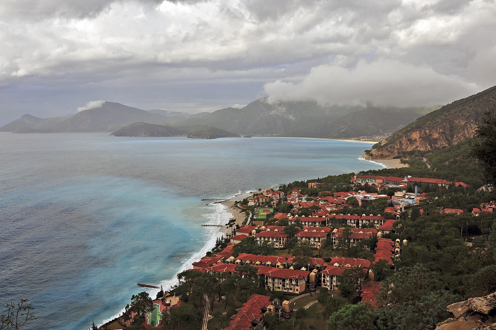 Coastal resort with mountains