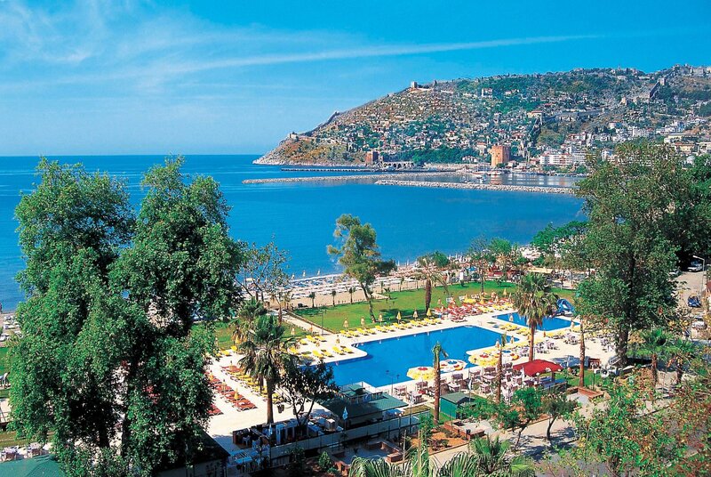 Coastal resort with pools and sea view