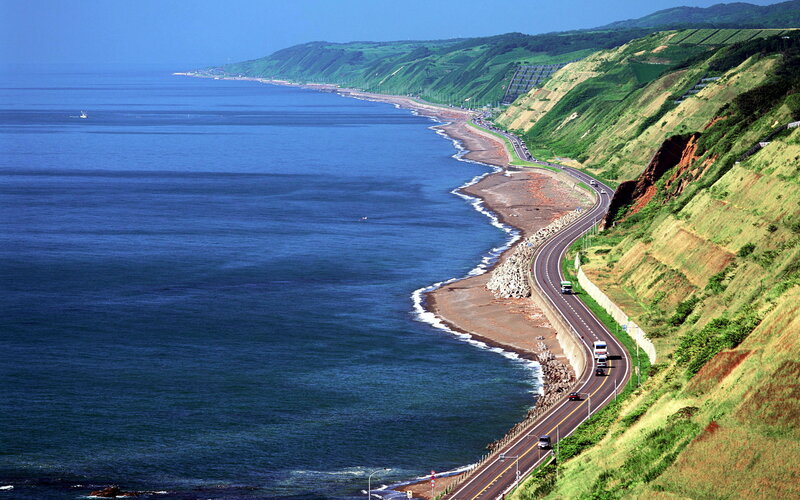 Coastal Road Along Cliffs — Blue