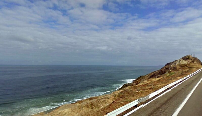 Coastal Road Along Ocean — Blue