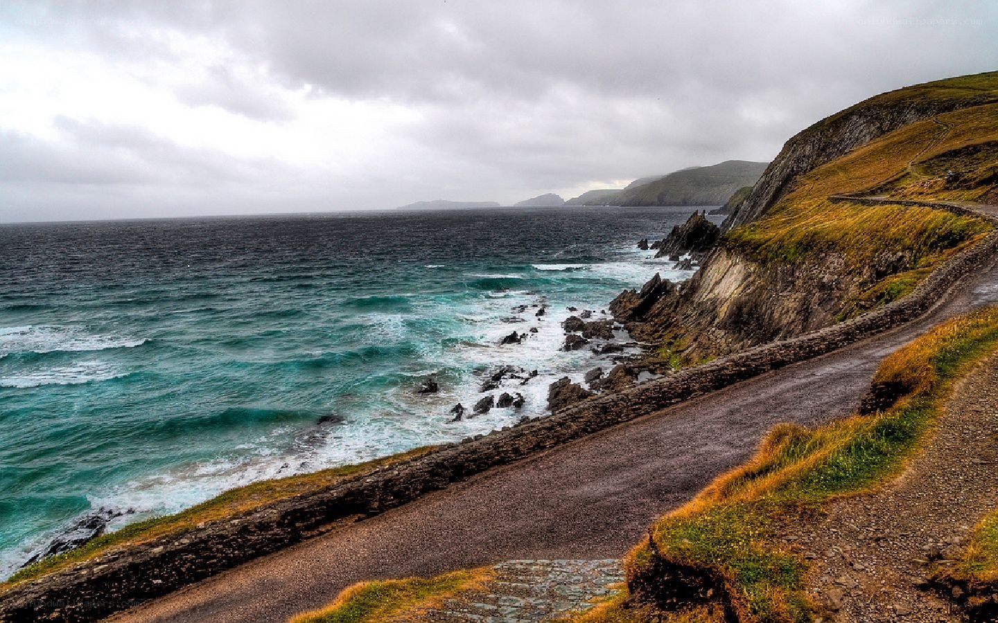 coastal road along rugged cliffs