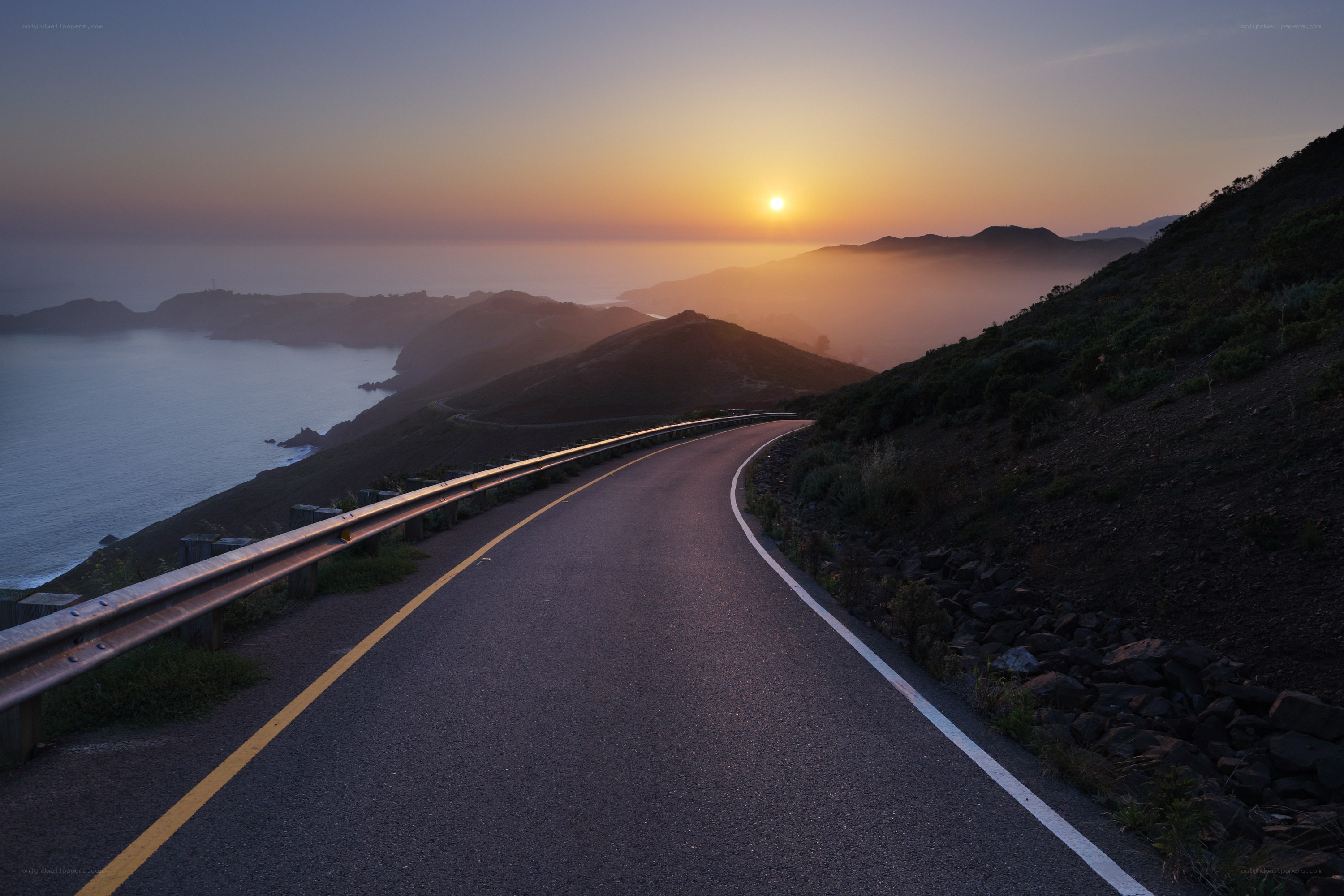 Coastal road at sunset