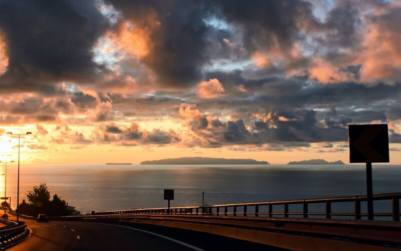 Coastal Road at Sunset — Orange