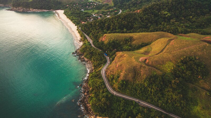 Coastal Road Winding Along Beach