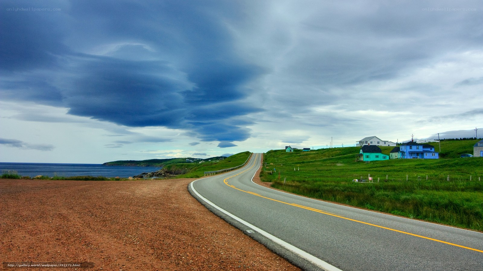 Coastal road with colorful houses