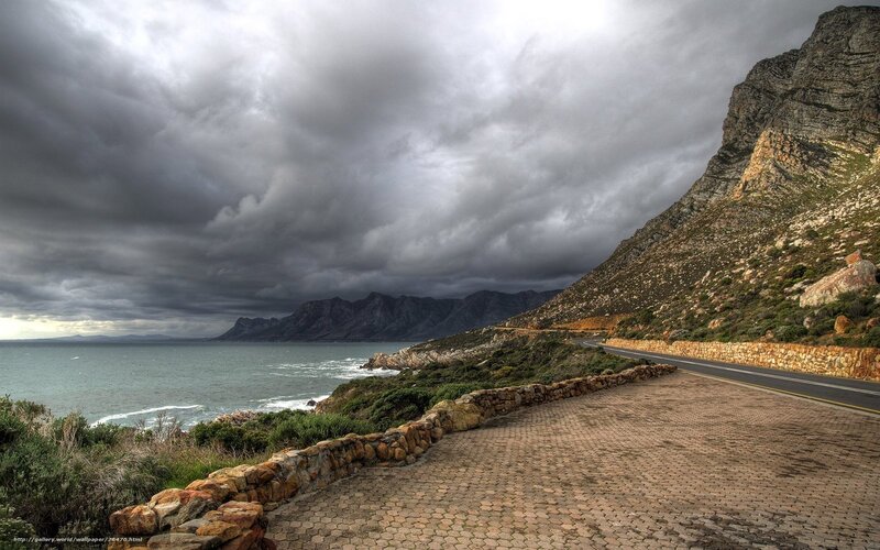 Coastal Road with Stormy Sky