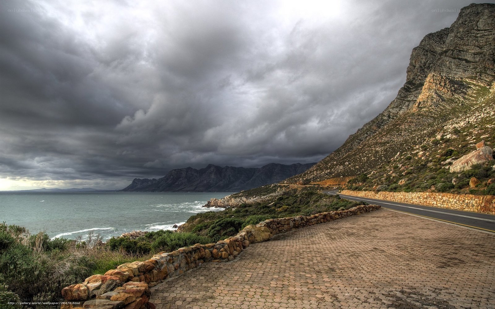 Coastal Road with Stormy Sky