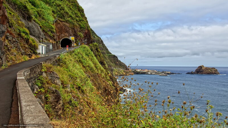 Coastal road with tunnel entrance