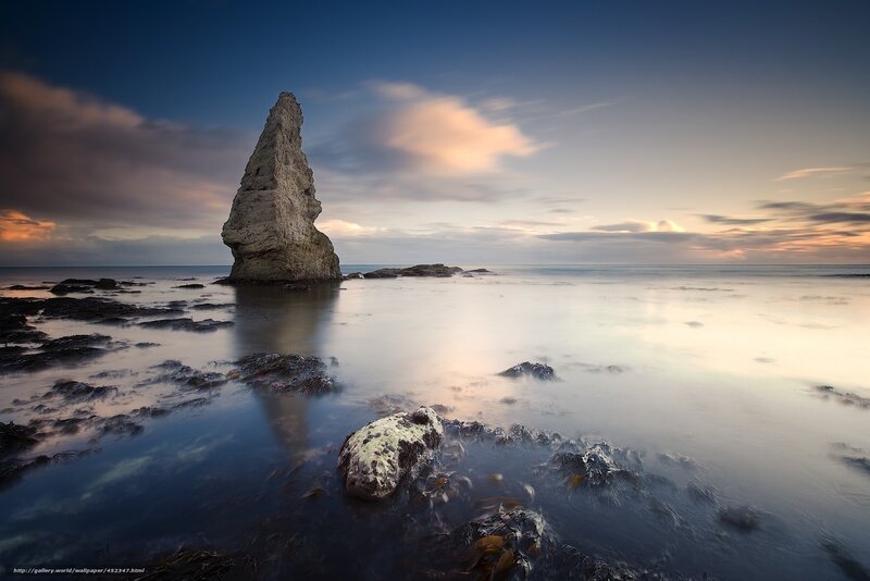 Coastal rock formation at sunset