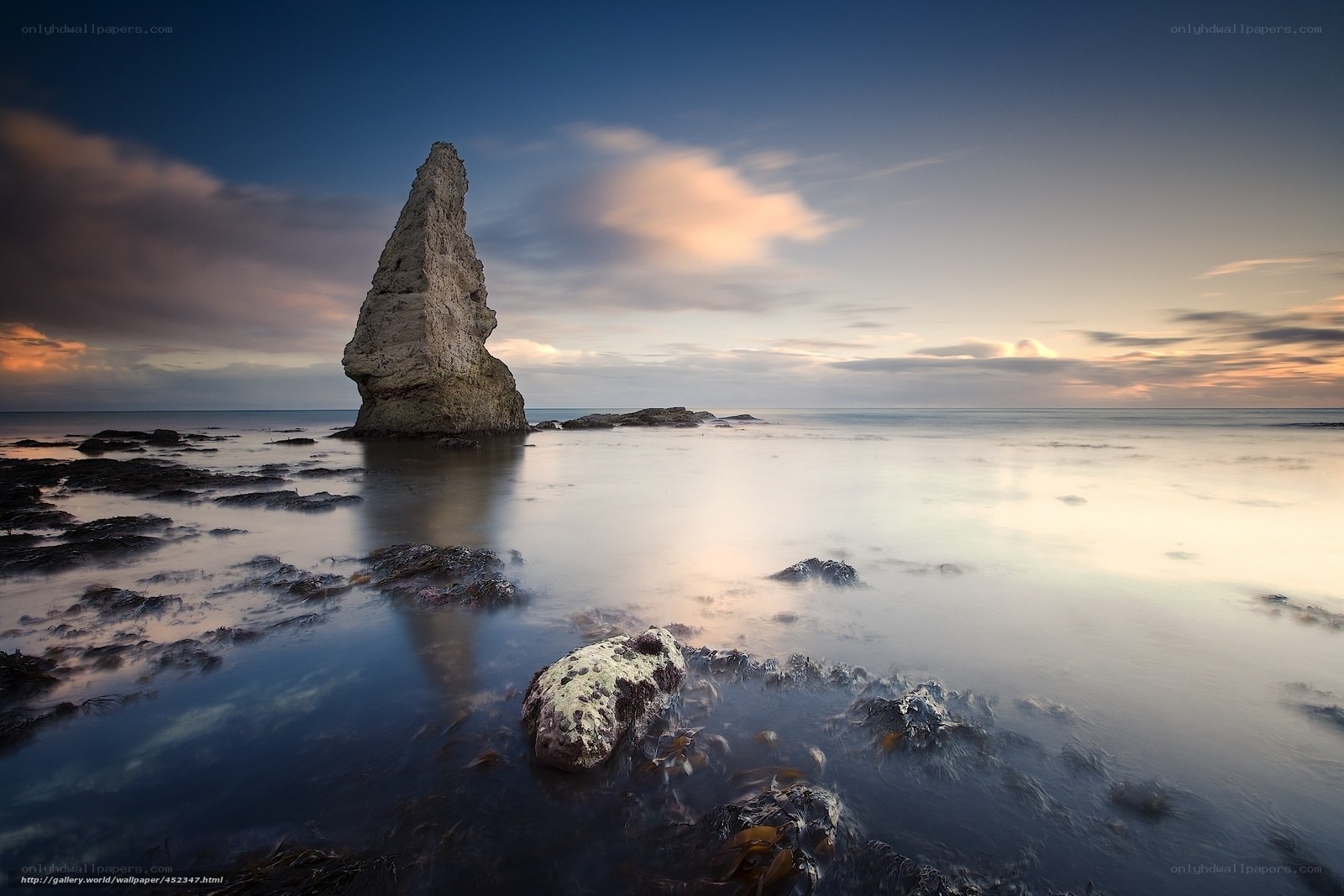 Coastal rock formation at sunset