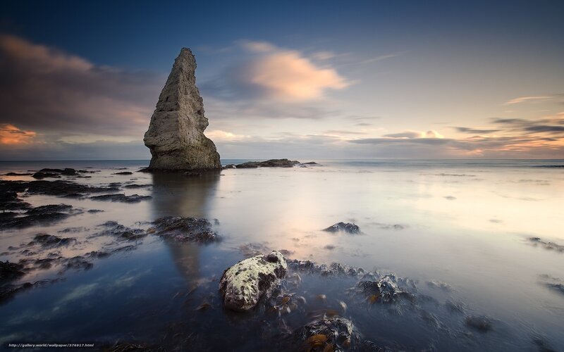 Coastal rock formation at sunset
