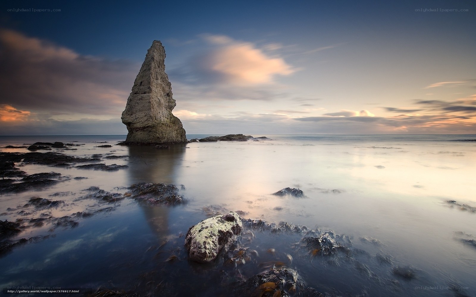 Coastal rock formation at sunset
