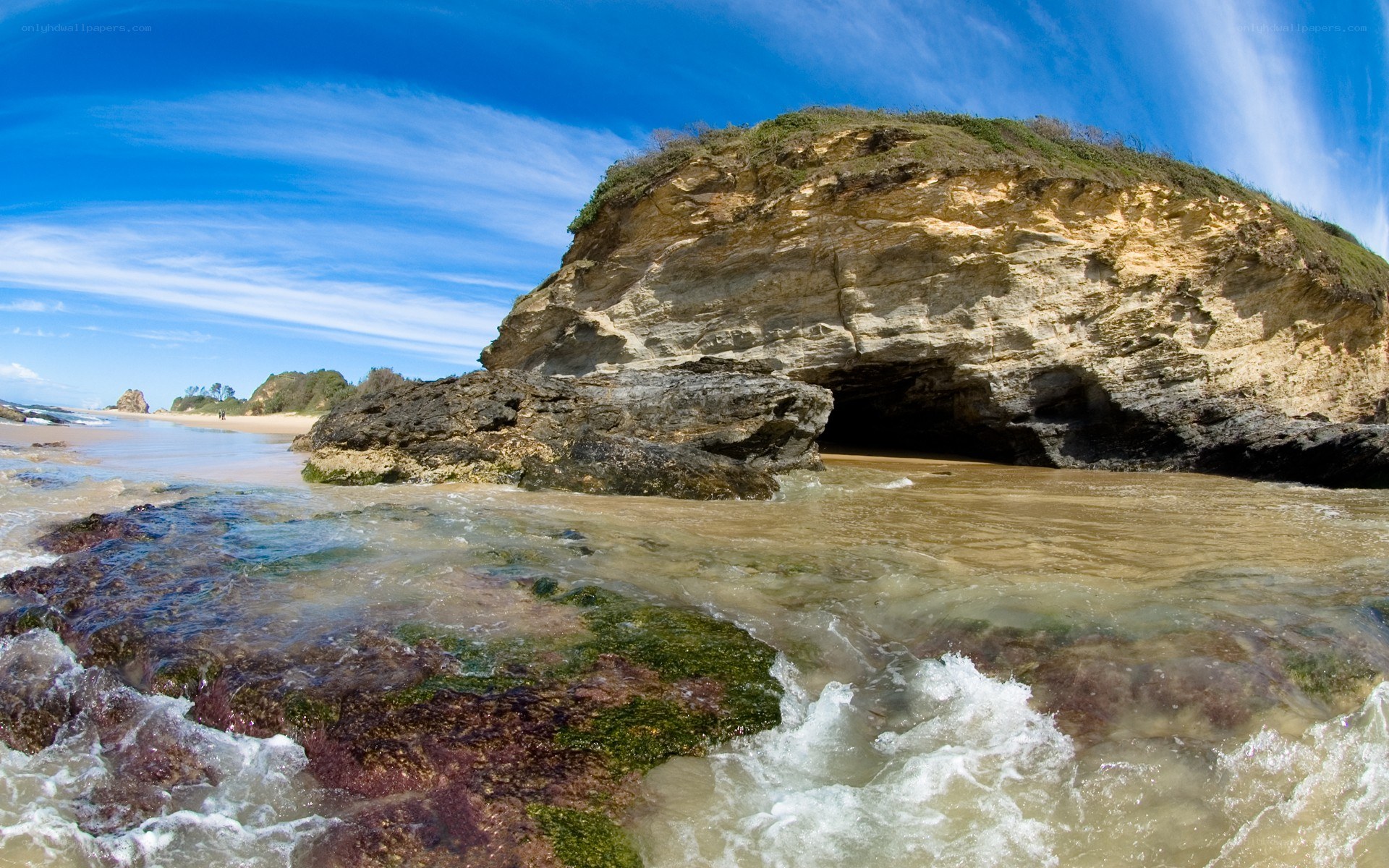 coastal rock formation with cave