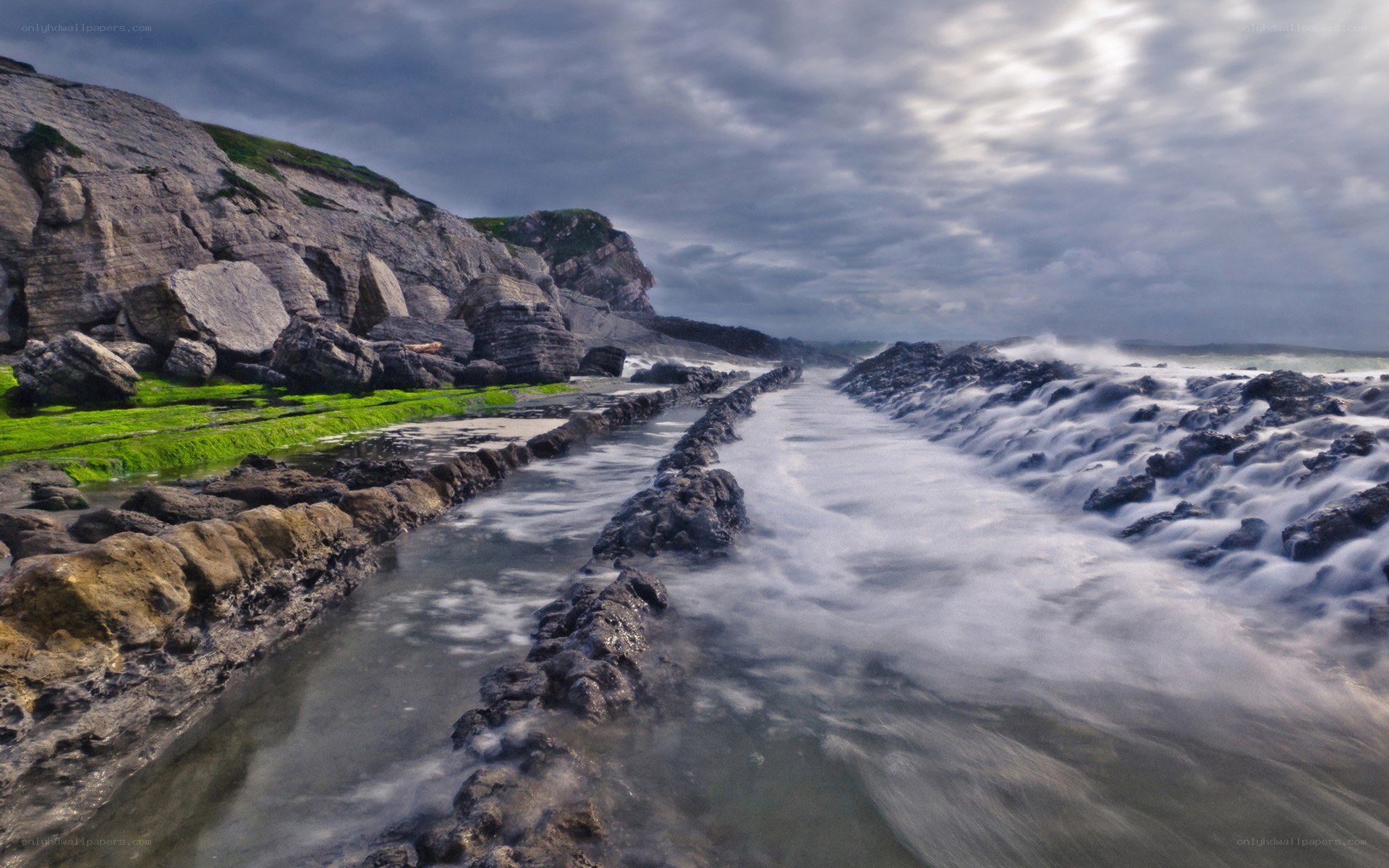 coastal rock formation with waves