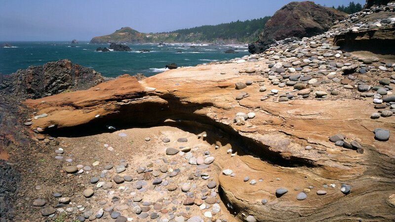 coastal rock formations and pebbles