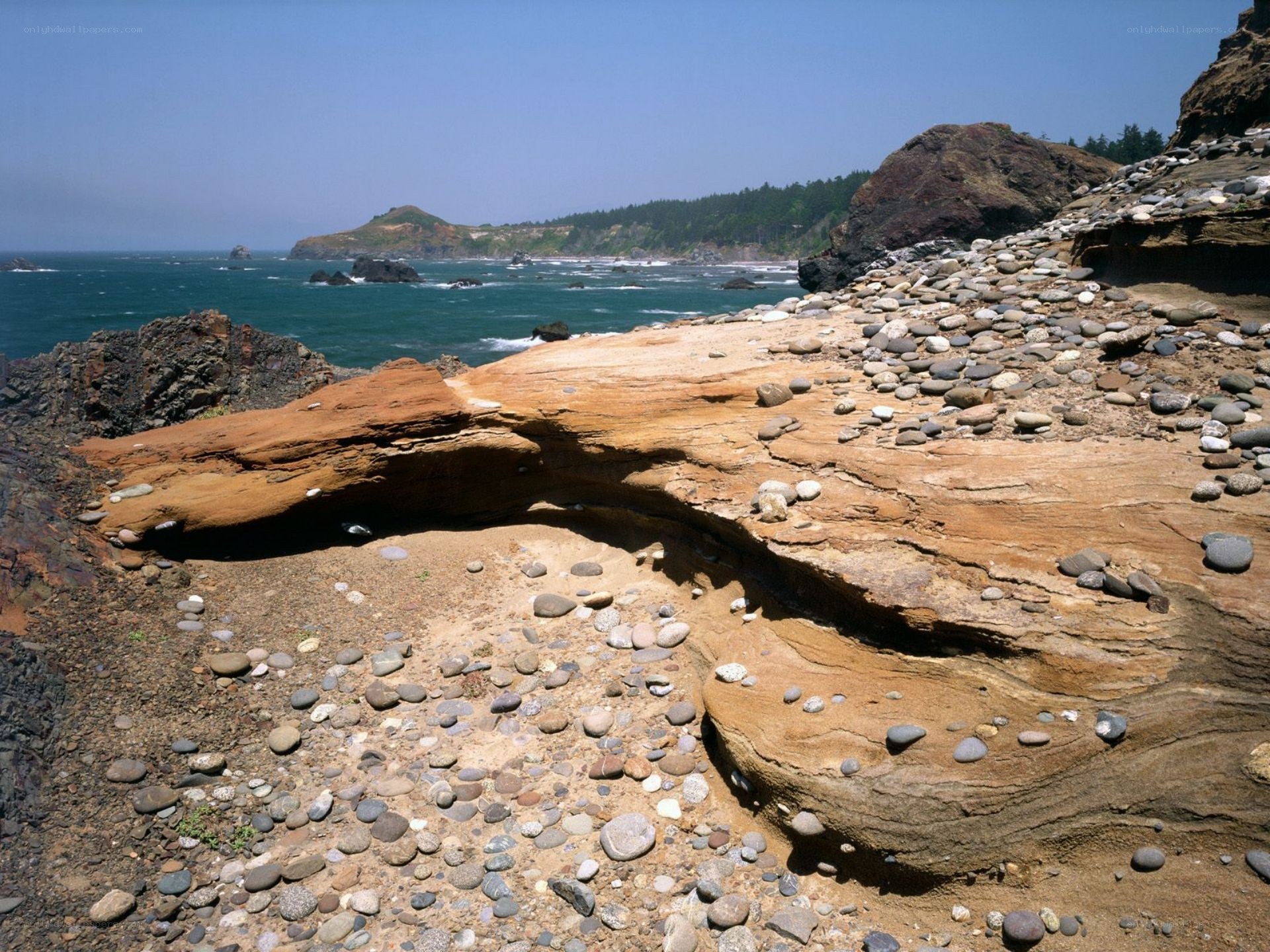coastal rock formations and pebbles