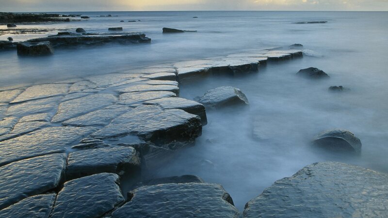 coastal rock formations at dawn