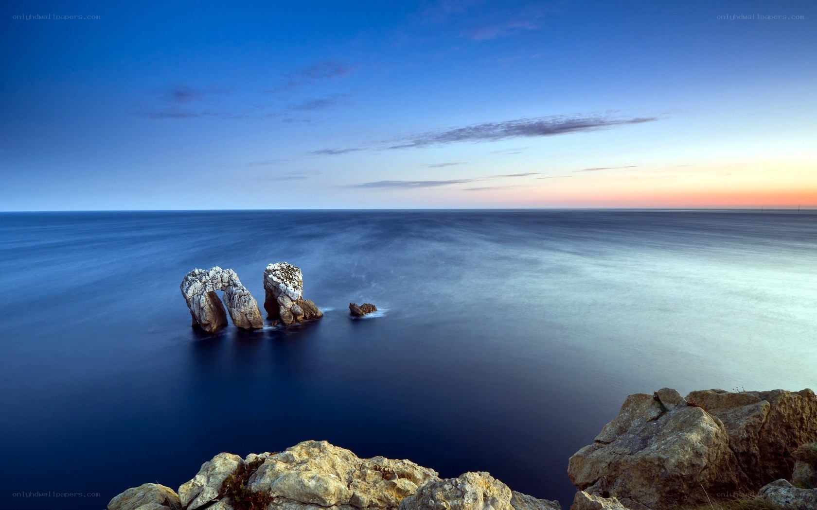 Coastal rock formations at dusk