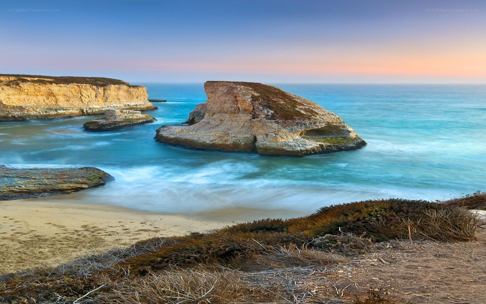 coastal rock formations at sunset