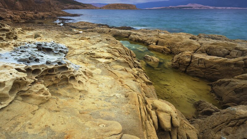 Coastal Rock Formations — Brown