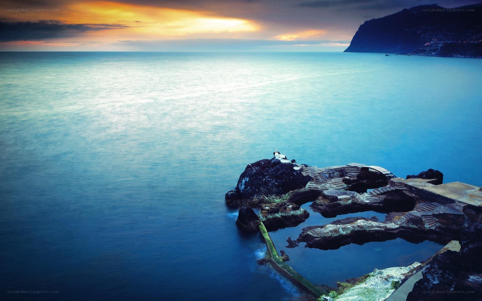 coastal rock pools at sunset
