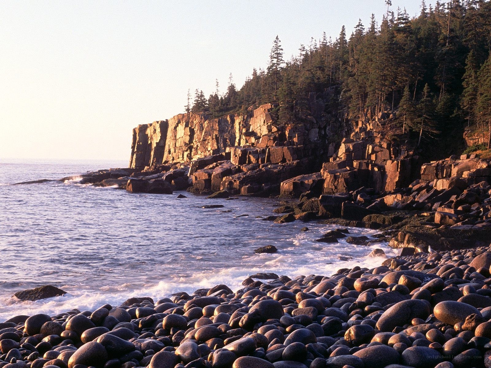 coastal rocks and cliffs at sunset
