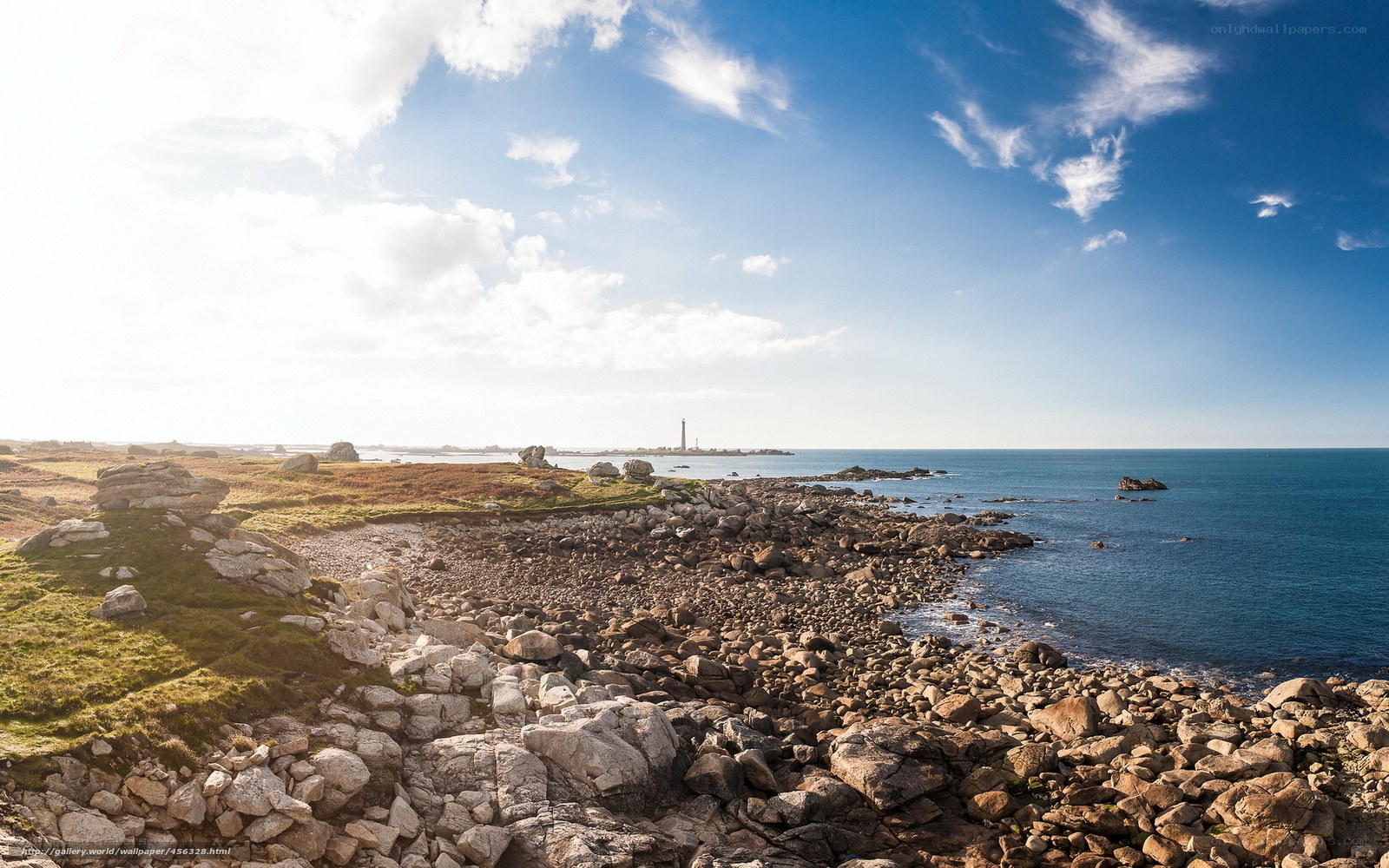 coastal rocks and lighthouse