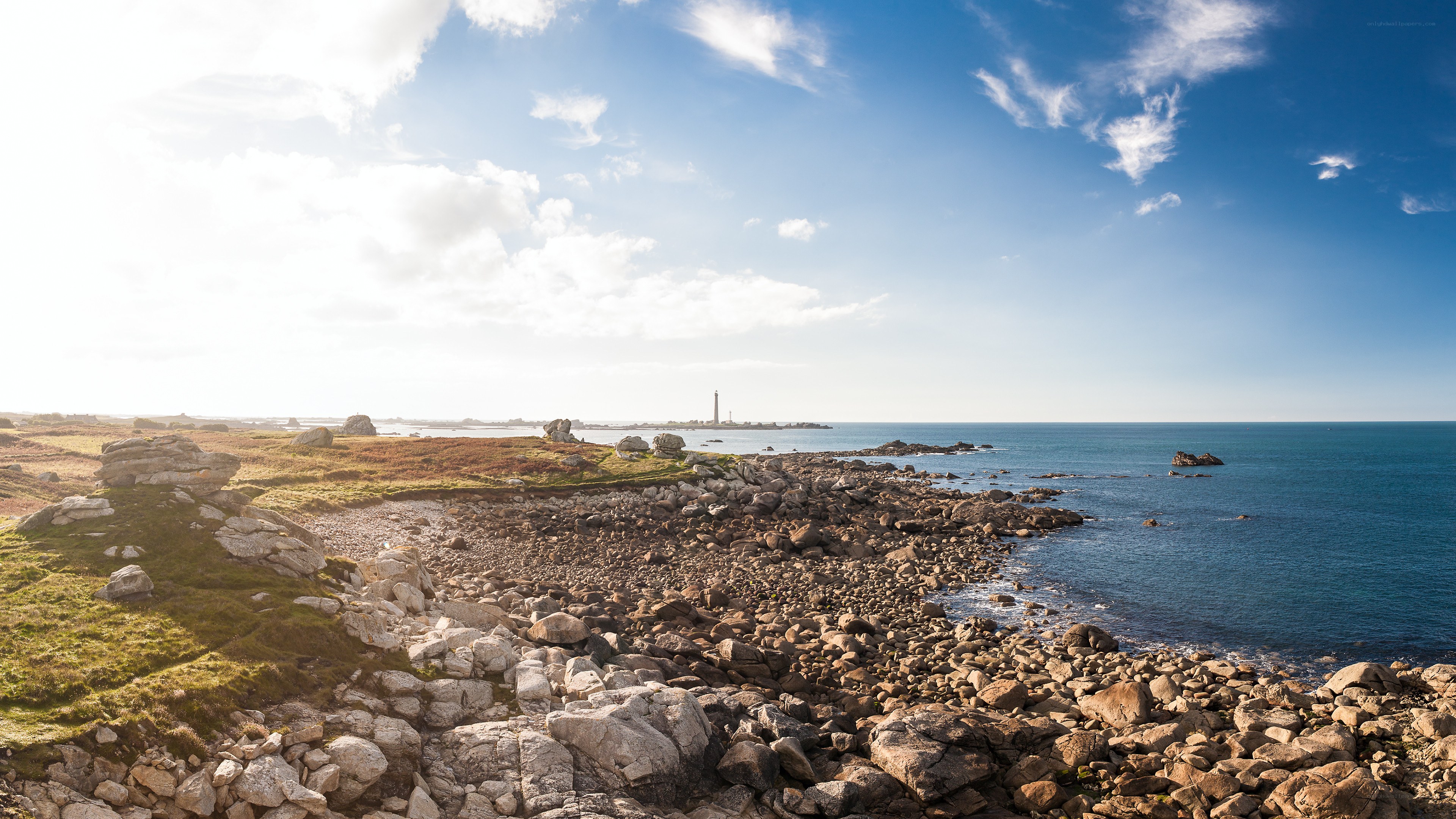 coastal rocks and lighthouse