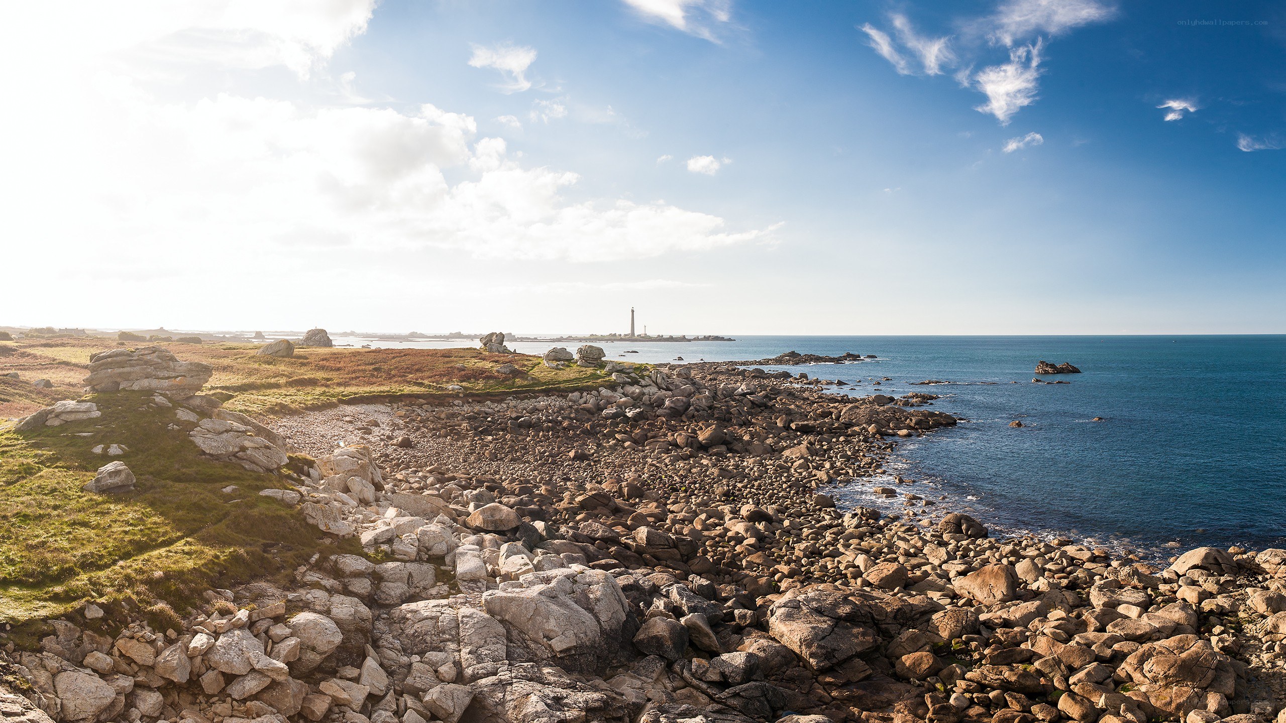 coastal rocks and lighthouse