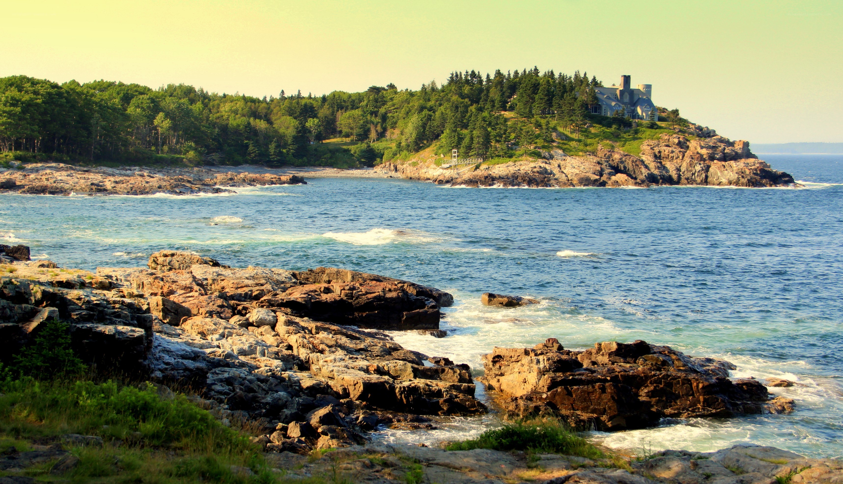 coastal rocks and lighthouse