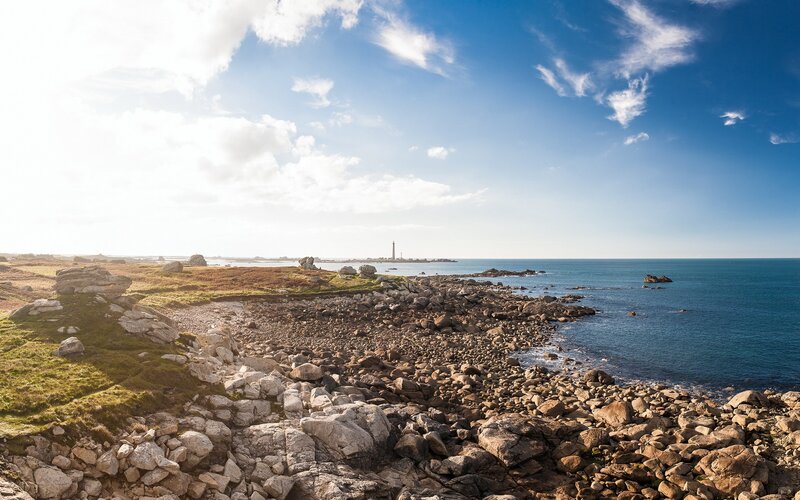 Coastal Rocks and Lighthouse — Blue, Serene, Afternoon, Photograph, Ocean, Sky