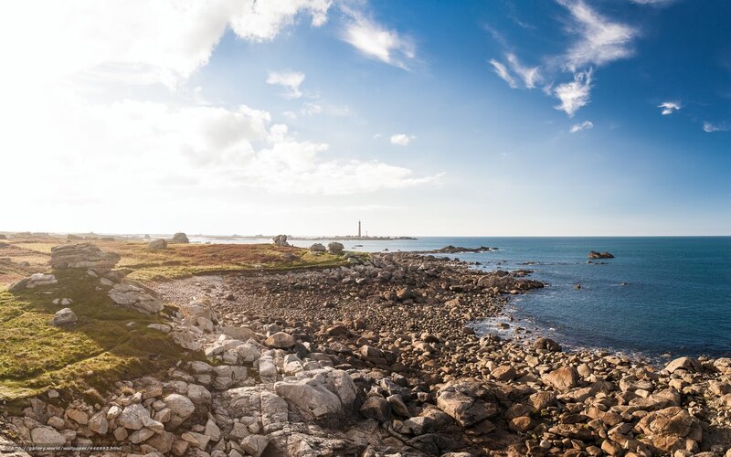Coastal Rocks and Lighthouse — Blue, Serene, Afternoon