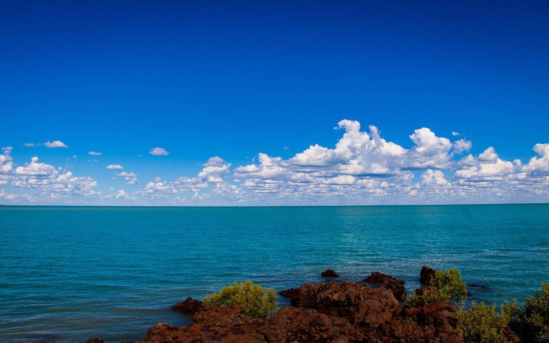 Coastal Rocks and Sea — Blue, Serene, Afternoon, Photograph, Clouds