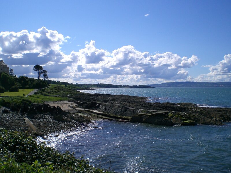 Coastal Rocks and Sea — Blue, Serene, Afternoon, Photograph, Clouds, Trees
