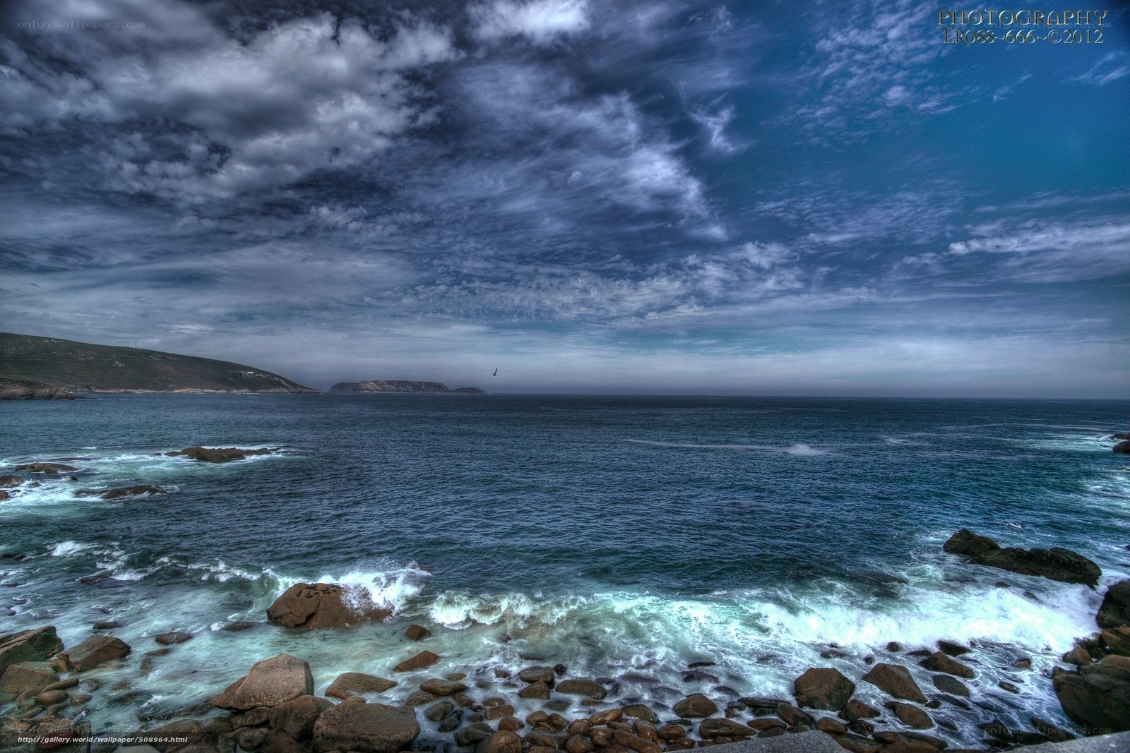 Coastal rocks and stormy sky