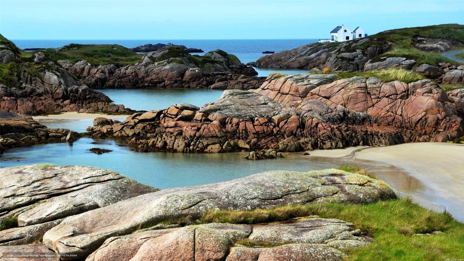 coastal rocks and white house