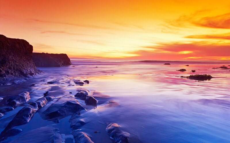 Coastal Rocks at Sunset — Orange, Serene