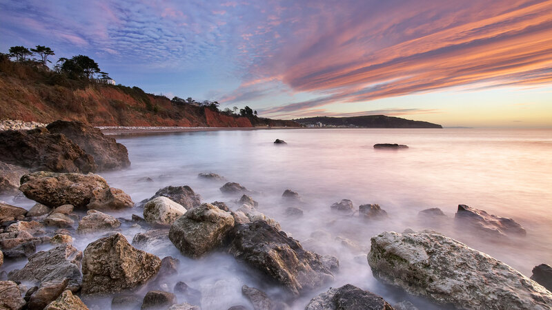 Coastal Rocks at Sunset — Pink, Serene
