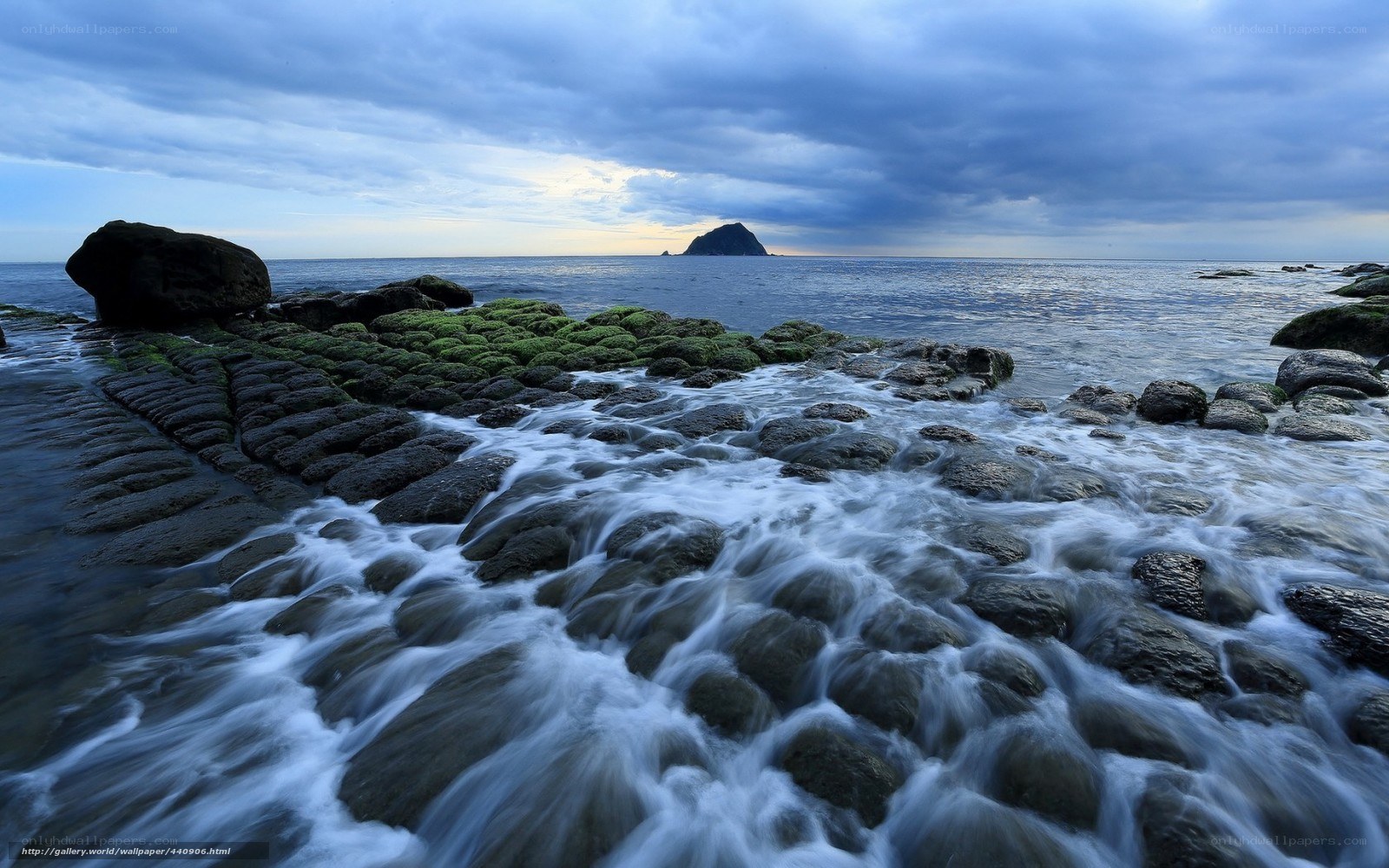 Coastal rocks with crashing waves
