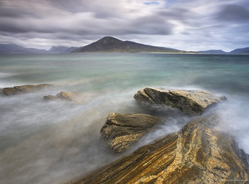 Coastal rocks with misty sea