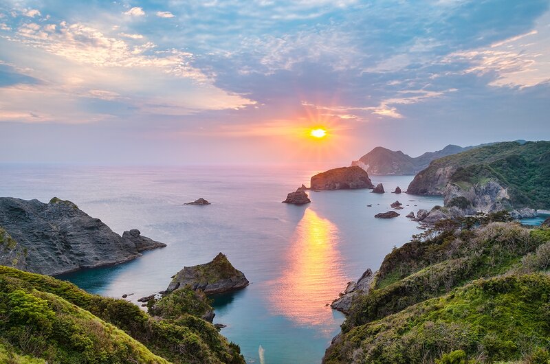 Coastal Sunset over Rocks